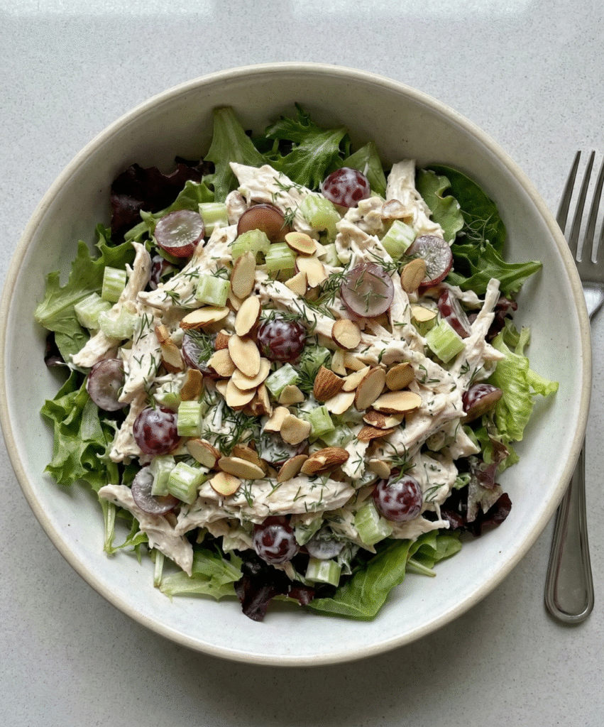 creamy chicken salad bowl with grapes, celery, Greek yogurt dressing and toasted almonds