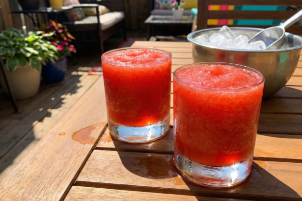 Cranberry lemon drop cocktails served in sugar-rimmed martini glasses, festive holiday cocktail drinks with fresh lemon and cranberries
